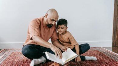 Father and Son Sitting on the Floor