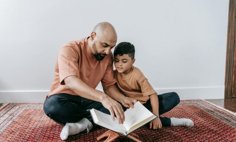 Father and Son Sitting on the Floor